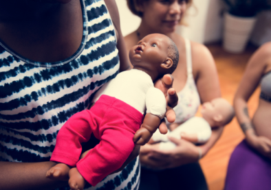 Realistic baby doll used in birth and parenting education group setting
