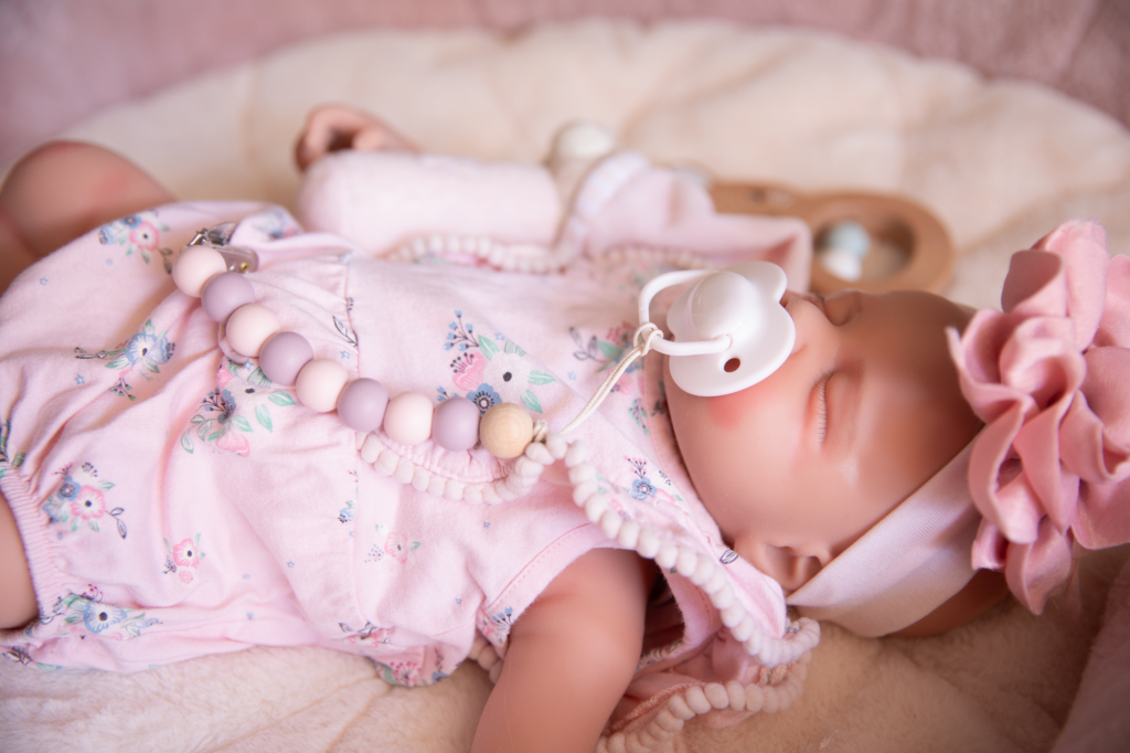Article image used for a blog explaining the difference between a reborn doll and a sensory comfort doll