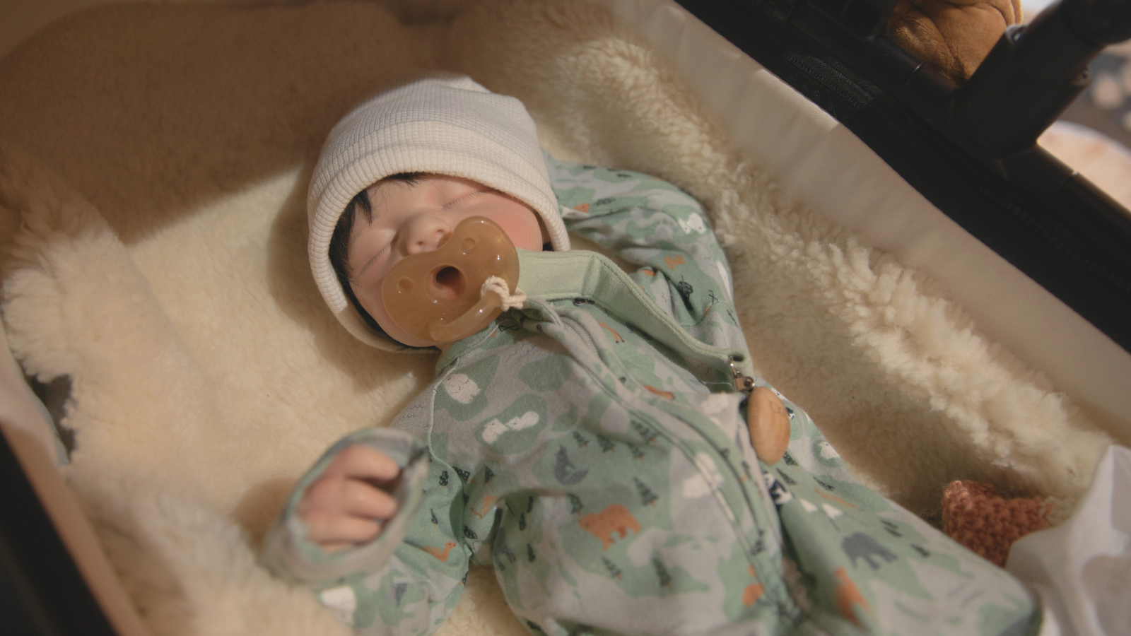 Image showing actual product Dreamy Days boy by Nurtura, a realistic weighted silicone baby designed for calm, rest and gentle connection