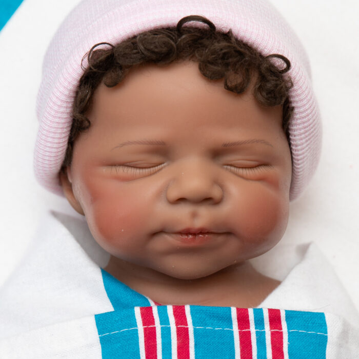 Big Hugs girl full body silicone reborn doll Australia, realistic weighted silicone reborn baby, headshot beanie image