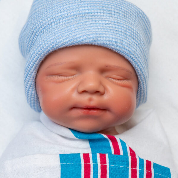 Calming Naptime boy full body silicone reborn doll Australia, realistic weighted silicone reborn baby, headshot beanie image