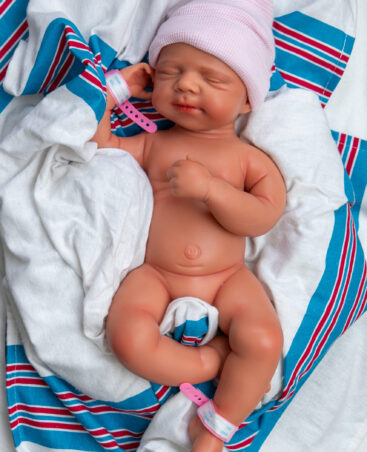 Calming Naptime girl full body silicone reborn doll Australia, realistic weighted silicone reborn baby, full body beanie bands image