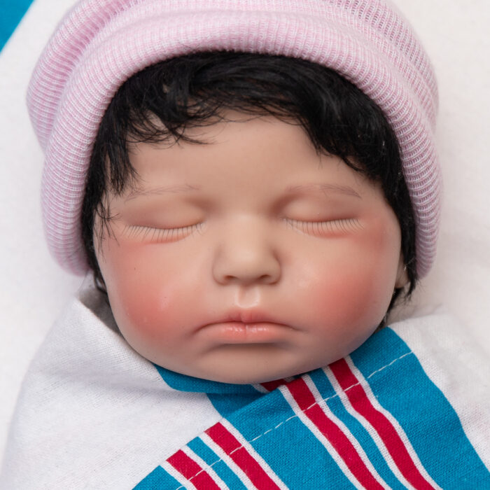 Cosy Cuddles girl full body silicone reborn doll Australia, realistic weighted silicone reborn baby, headshot beanie image