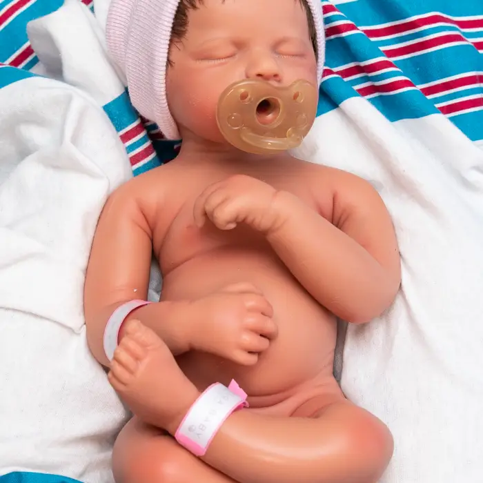 Gentle Dreams girl full body silicone reborn doll Australia, realistic weighted silicone reborn baby, full body dummy beanie bands image