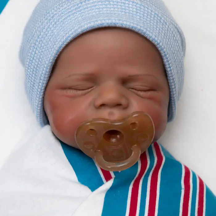 Peaceful Embrace Boy baby boy full body silicone reborn doll Australia, realistic weighted silicone reborn baby, headshot beanie image